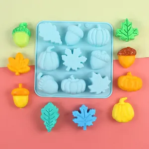 Detail view of 9-cavity autumn leaf and pumpkin silicone mold for DIY baking