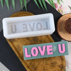 Professional silicone mold for making rectangular candles with pink LOVE U letters