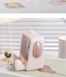 Detailed side view of a cute cartoon dog-shaped desk alarm clock for bedside decor