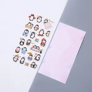 Vista detallada de lindos adhesivos washi de pingüinos para manualidades y diarios