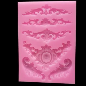 High-detail view of ornate baroque patterns in a pink silicone DIY fondant craft mold
