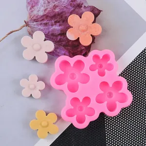 Pink silicone mold with flower-shaped cavities for DIY chocolate and cake decorating