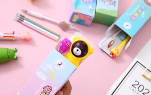 Close-up detail of creative cartoon animal pen emerging from surprise blind box packaging