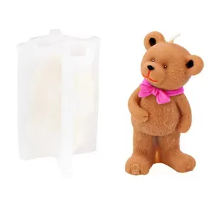 Detail view showing 3D standing bear silicone mold and the finished brown bear candle