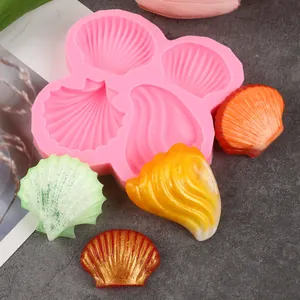 Close-up view of a pink seashell silicone mold showing detailed ocean shell DIY results