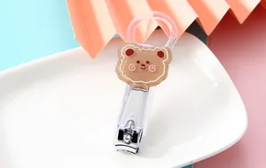 Cute cartoon bear transparent nail clipper with pink ring handle for daily manicure care
