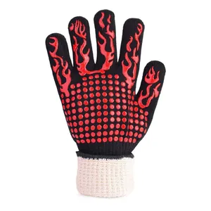 Close-up of heat-resistant BBQ glove with red flame pattern and silicone grip dots.