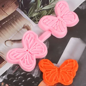 Detail of butterfly silicone fondant mold with embossed pattern for cake decorating