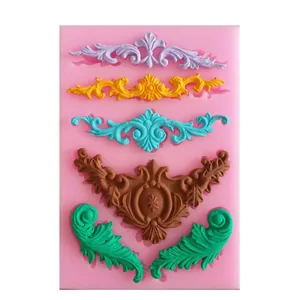 Baroque style silicone fondant mold with multi-pattern scroll and flourish designs
