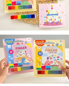 Detail view of the finger painting kit featuring 60-page book and 6-color ink pad