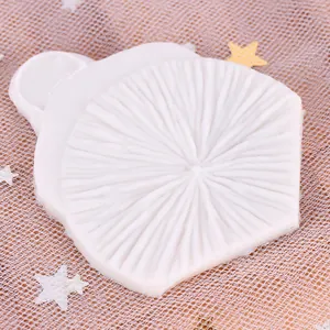 Detailed macro view of a white floral textured silicone mold for DIY cake and chocolate