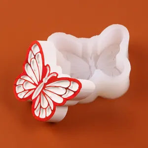 Vue détaillée d'un moule en silicone papillon 3D pour décorations de gâteaux DIY