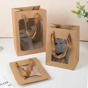 Sacchetti regalo in carta kraft marrone con finestra trasparente e manici a nastro