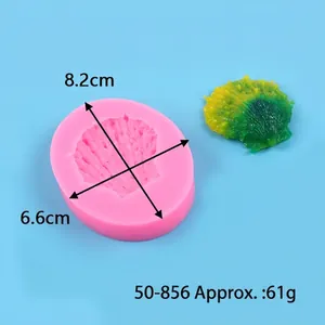 Detailed pink seashell silicone mold with 8.2x6.6cm size guide and finished green shell