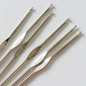 Detailed view of 1.50mm stainless steel crochet hooks used for candle wick threading