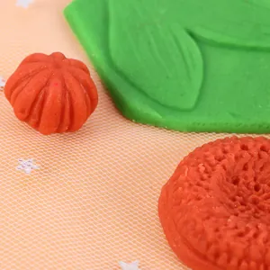 Close-up macro detail of silicone cake mold textures for flower and leaf shapes DIY