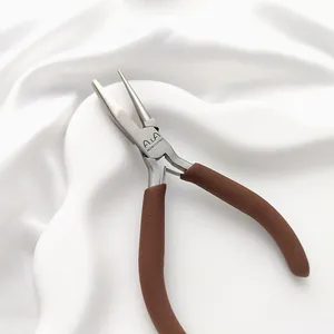 Detailed view of professional carbon steel jewelry pliers with brown soft-grip handles.