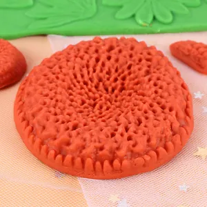Macro detail of sunflower core texture for DIY flower silicone cake mold tool.