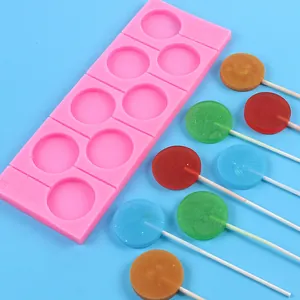 Vista detallada del molde de silicona rosa de 8 cavidades para piruletas DIY y dulces redondos