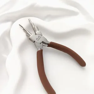 Detailed view of 6-step carbon steel jewelry bail making pliers with brown handles