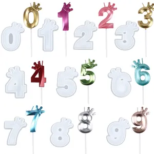 Set of crown number birthday candles and matching silicone molds for cake decoration