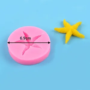 Detail of pink starfish silicone mold showing 6.9cm diameter and finished yellow starfish