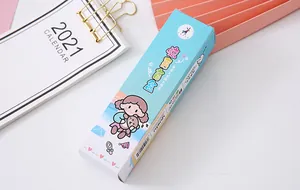 Detailed macro shot of the light blue packaging for the creative surprise blind box pen