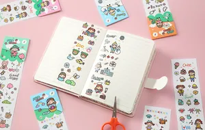 Close-up of cute cartoon waterproof PVC stickers for DIY journaling and decoration