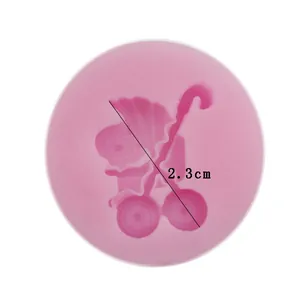 Detailed close-up view of a pink baby stroller silicone mold with 2.3cm dimension marker