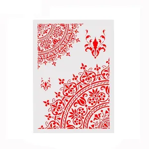 Detailed DIY hollow painting stencil with intricate red mandala patterns for art crafting