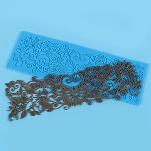 Detail der Silikonform für Blumen-Spitze mit blauem Strukturblatt und braunem Dekor