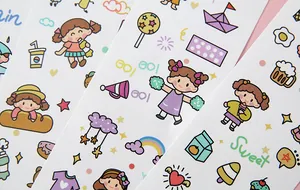 Detailed view of cute cartoon girl and food patterns on waterproof PVC stickers for journals