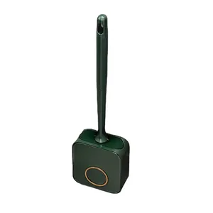 Escobilla de baño de silicona verde oscuro con detalles dorados de lujo y base