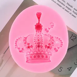 Detailed macro view of a pink circular silicone crown mold for DIY fondant cake baking