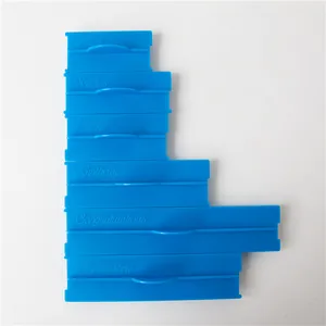 Detailed view of 6pcs blue fondant stamps featuring cursive script greeting phrases