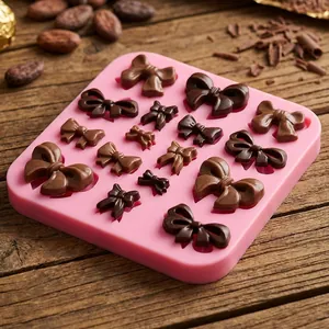 Molde de silicona rosa versátil con varias formas de lazos para chocolate y decoración de pasteles