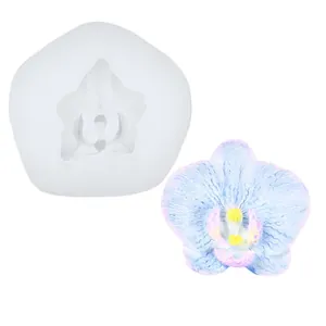 Detail view of orchid-shaped silicone mold and colorful finished resin flower accessory