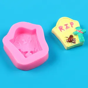 Close-up of Halloween tombstone silicone mold with spider and cross for DIY candy making