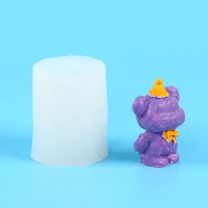 Professional silicone 3D bear candle mold shown with a finished purple bear figurine