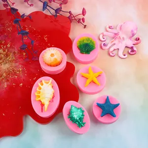 Detailed view of sea life silicone molds for fondant starfish and seashell crafts