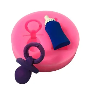 Detail view of pink silicone baby bottle and pacifier mold for DIY handmade crafts and resin