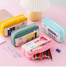 Estuches de lona de colores pastel con cremalleras dobles y estampados de eslóganes