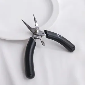 Close-up of mini stainless steel jewelry needle nose pliers for DIY crafting