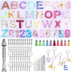 Complete DIY epoxy resin kit with alphabet molds, hand drill, and keychain accessories