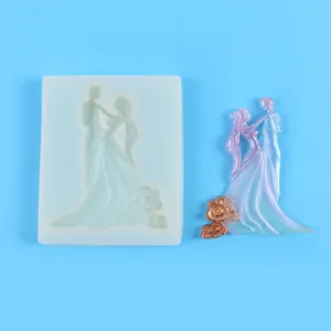 Vue détaillée d'un moule en silicone mariés dansant avec une belle pièce en résine