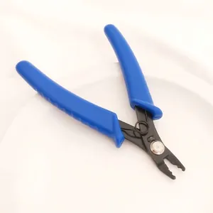 Detailed view of mini jewelry pliers featuring ergonomic blue handles for DIY beading