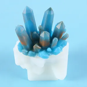 Close-up detail of a DIY silicone mold featuring a blue crystal cluster resin piece.