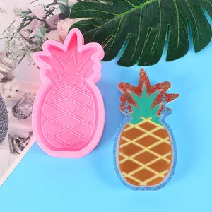 Pineapple shaped silicone mold for fondant or resin DIY crafts shown with finished sample