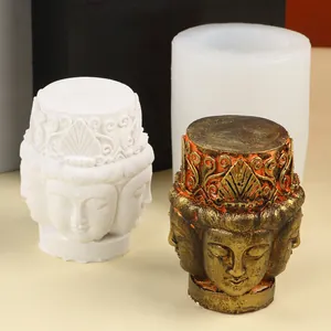 Vue détaillée du moule en silicone tête de Bouddha avec échantillons en cire