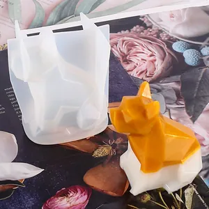 Detail of geometric French Bulldog silicone mold and a finished yellow resin craft